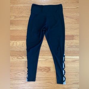 Marika Leggings Women’s Medium Black Cropped Pants Criss Cross Mesh Panels Sides